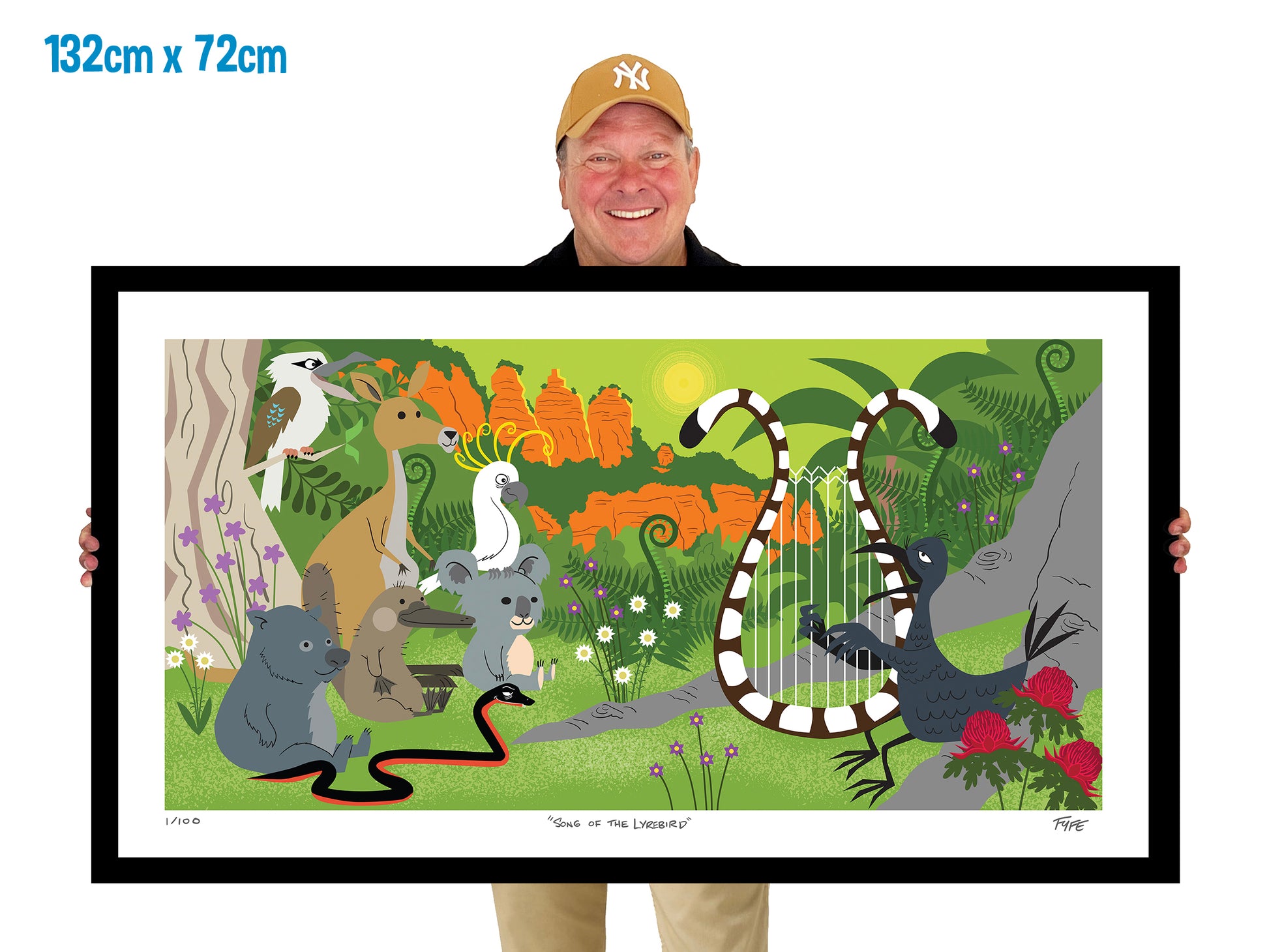 Man holding a large framed artwork of animals in a forest setting