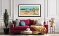 Living room with a red sofa, colorful cushions, and a framed artwork of a beach scene.