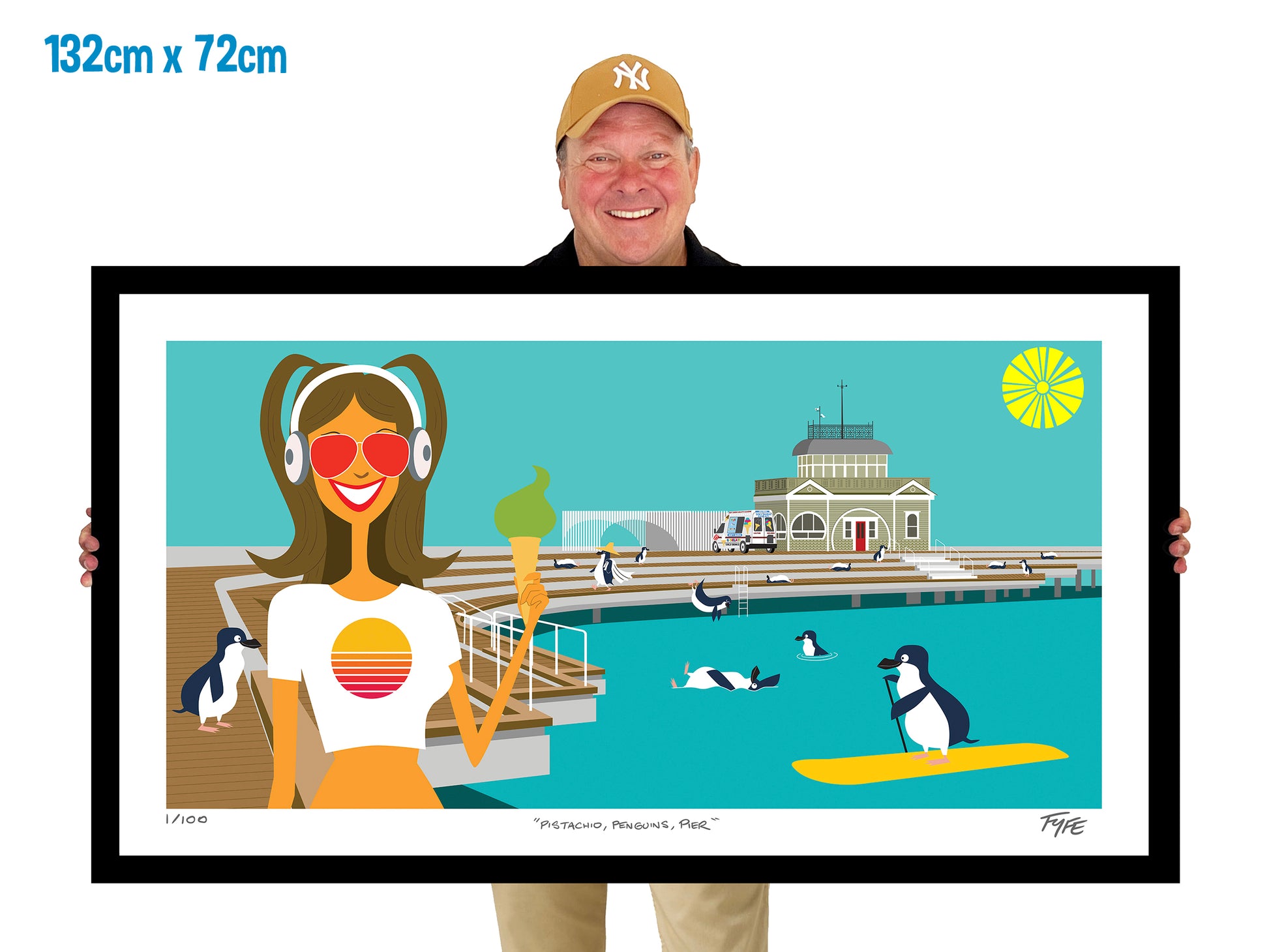Man holding a framed artwork of a woman by a pool with penguins.