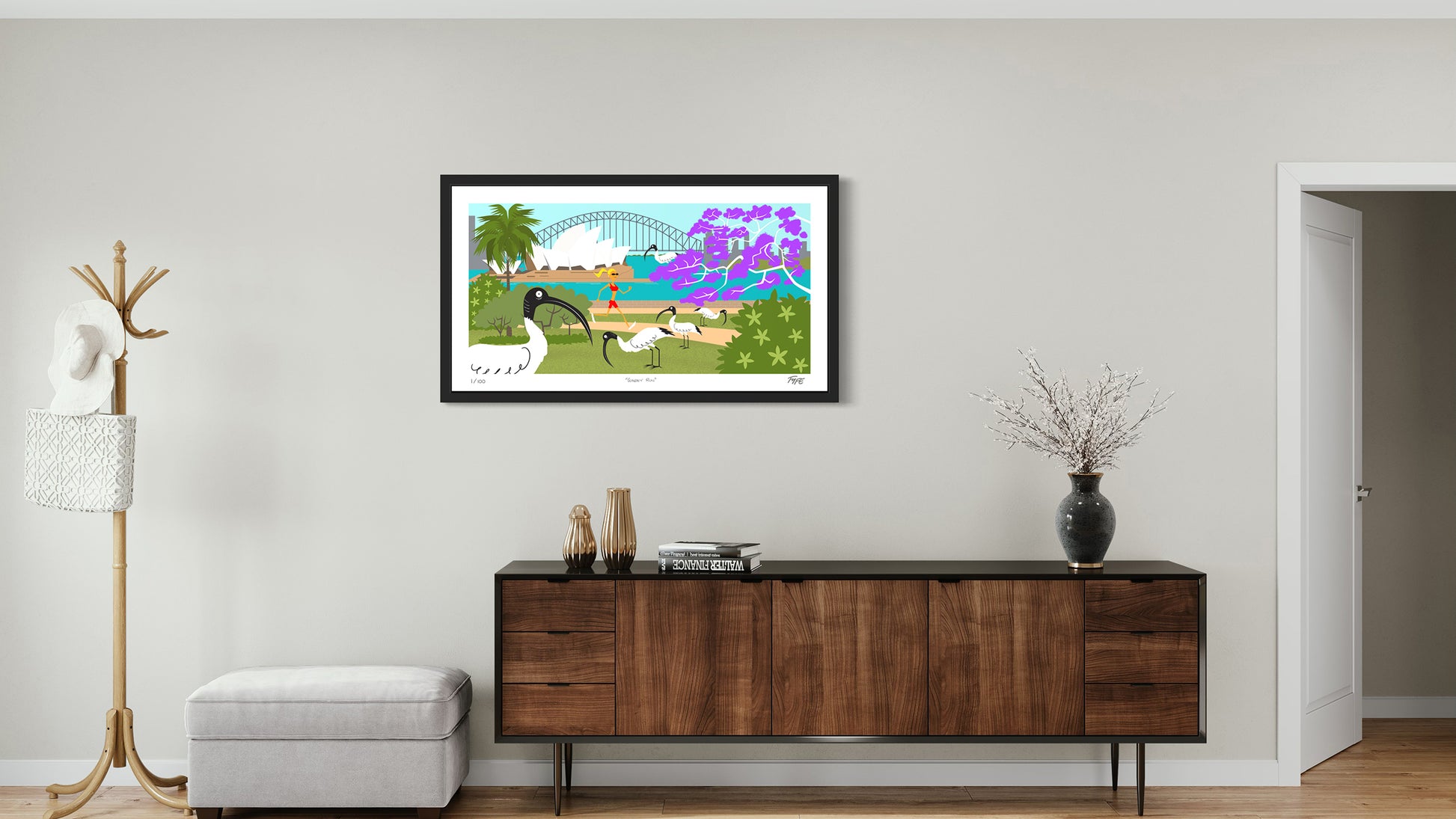Living room with a wooden sideboard, decorative items, and a colorful framed picture on the wall.