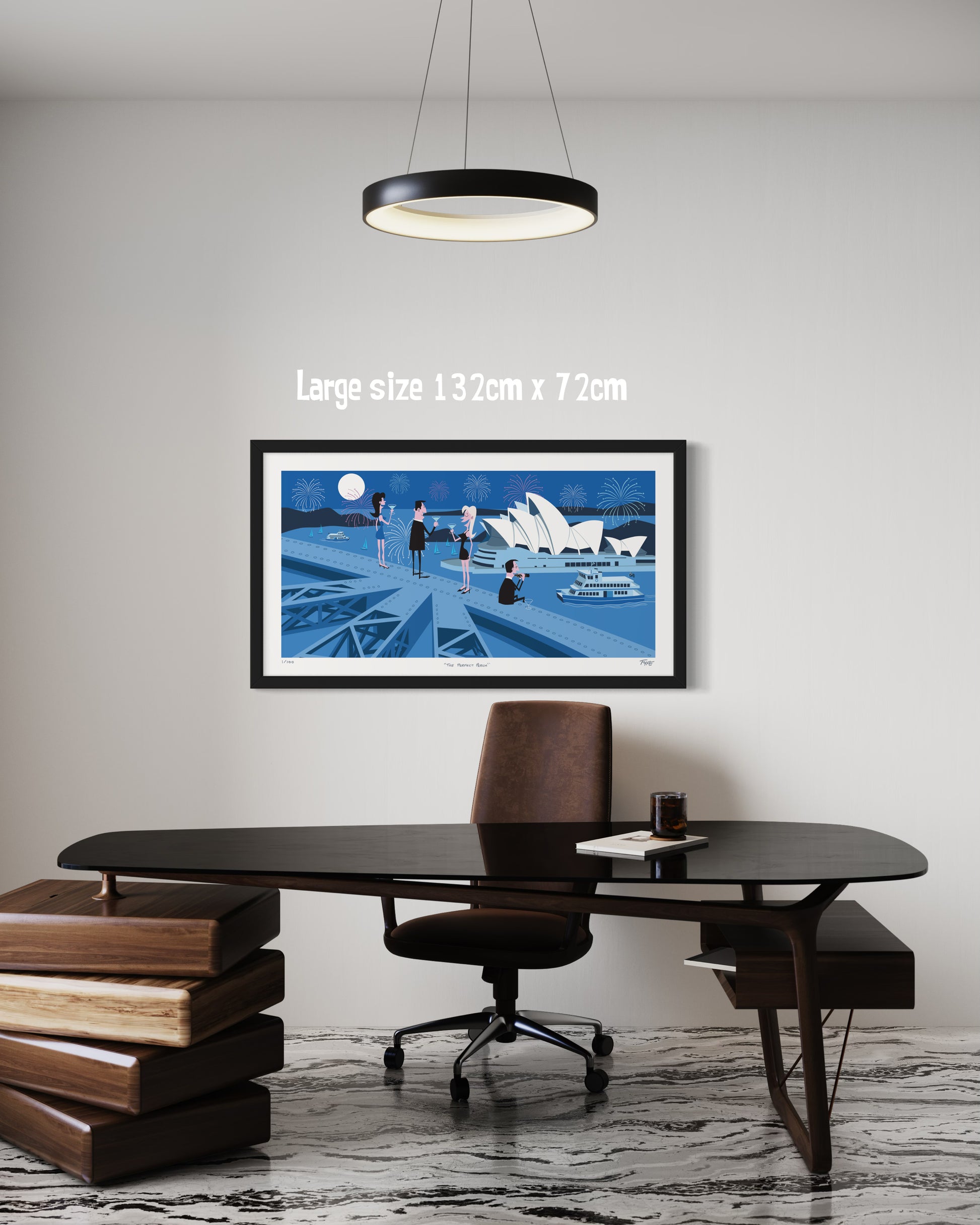 Framed artwork of a cityscape with a desk and chair in a modern office setting.