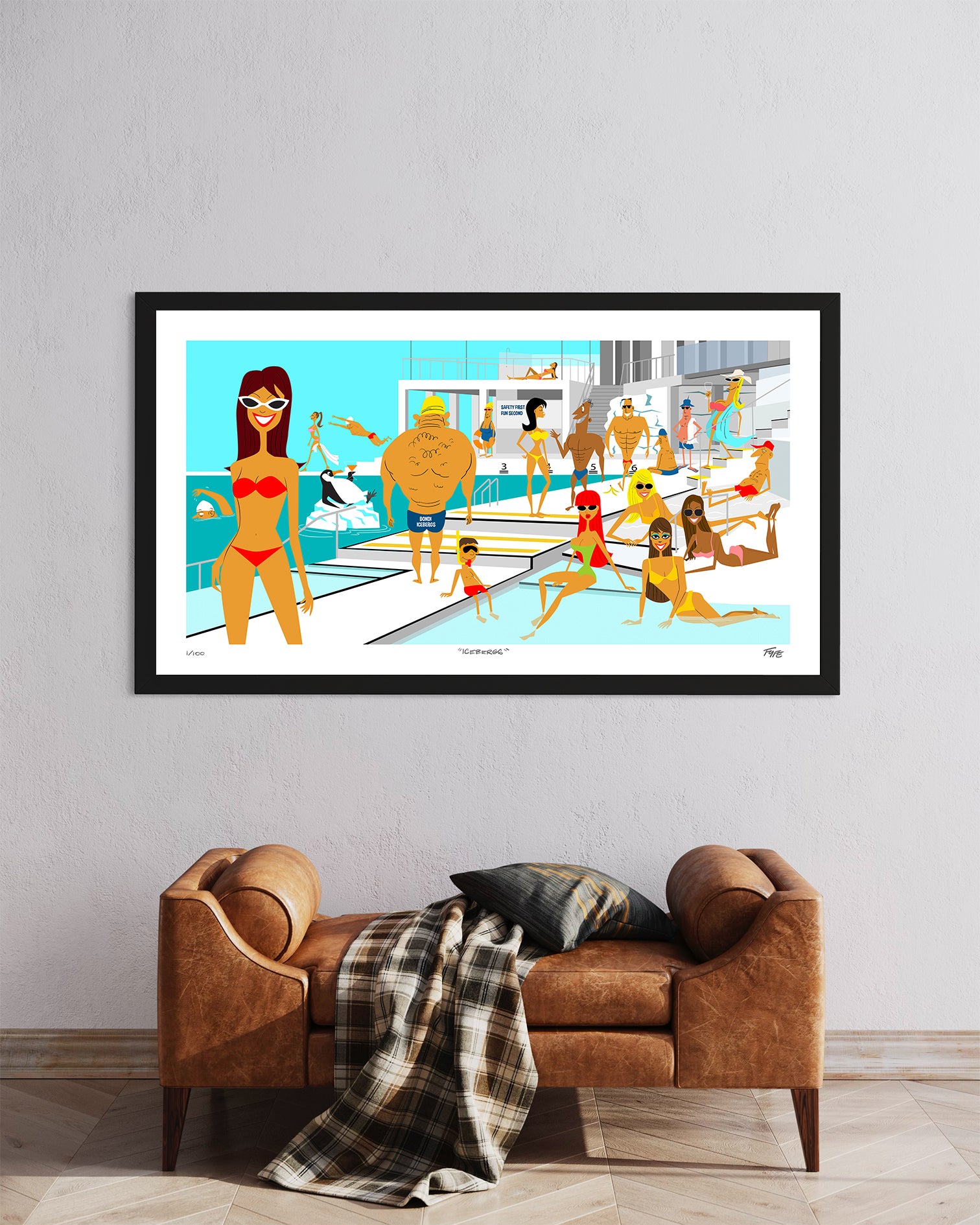 Framed artwork of a pool party scene with people in swimsuits on a wall above a brown sofa.