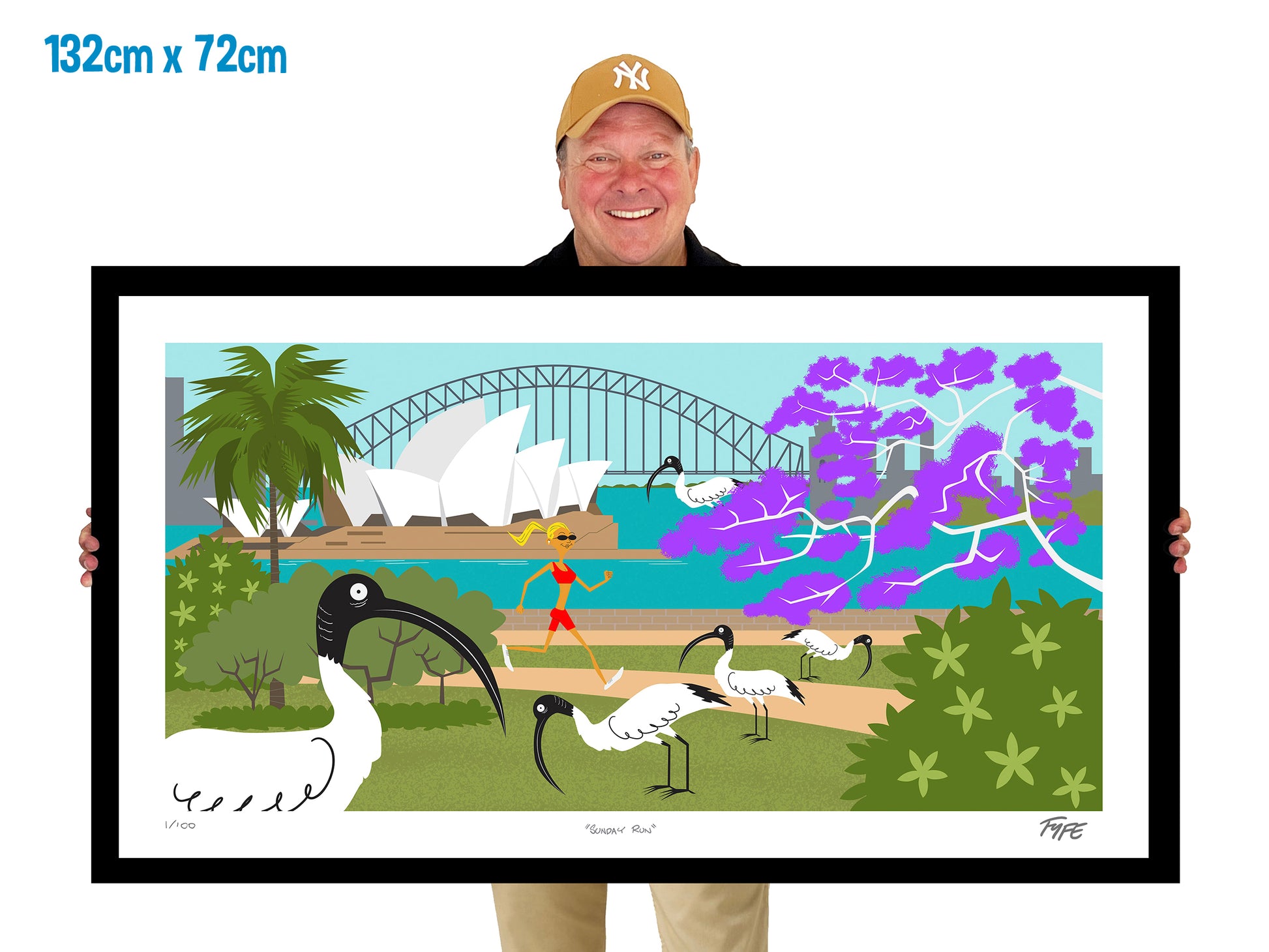 Man holding a large framed artwork of the Sydney Harbour Bridge with birds and a bridge.