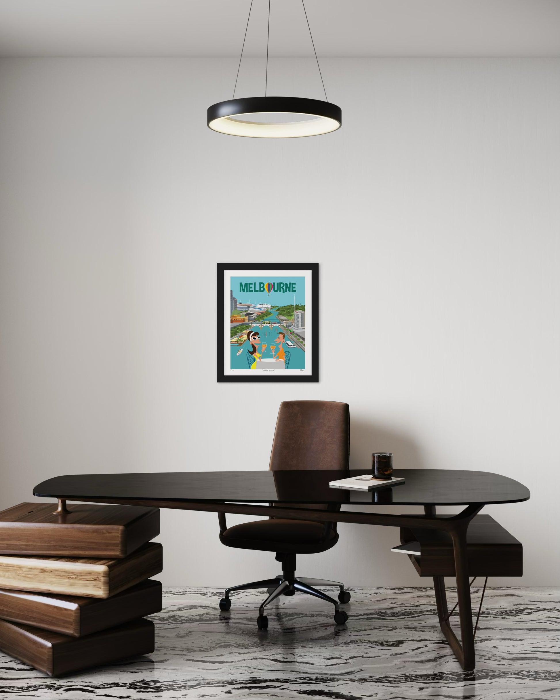 Modern office setup with a desk, chair, and framed poster on the wall.